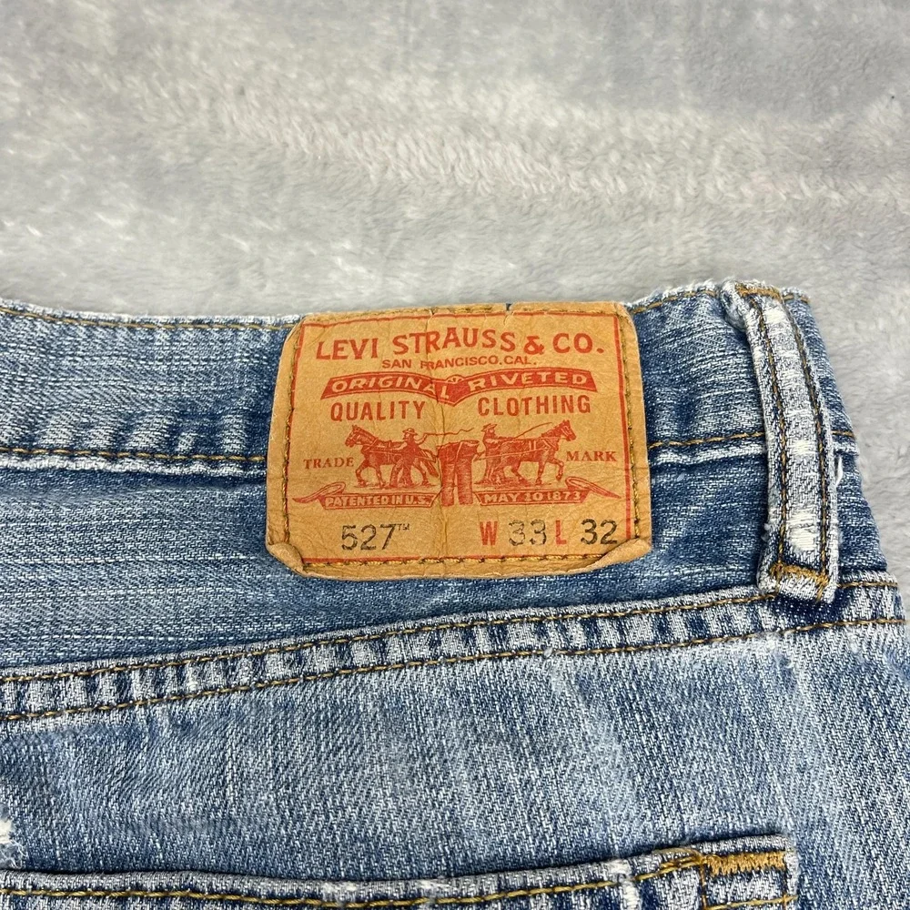 Levi's Jeans Mens 33x32 Blue Denim Medium Wash Comfy 527 Slim Bootcut Leg Grunge